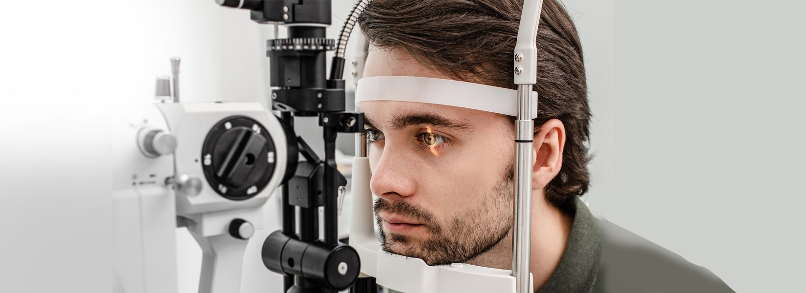 young man during eye exam in Hendersonville